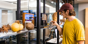 Person looking at natural history specimens on a shelf