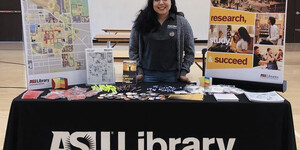 Alexis Juarez stands at the ASU Library student orientation booth