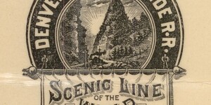 Railroad logo magnified to show detail and tagline reading “Scenic Line of the World”