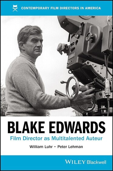 Black and white image of Blake Edwards with movie camera