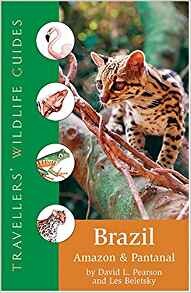 Cover of "Travellers' Wildlife Guide: Brazil, Amazon And Pantanal" featuring a photo of a wild cat