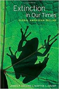 Cover of "Extinction in Our Times" featuring a frog on a leaf