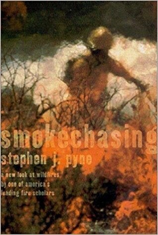 Cover of "Smokechasing" featuring a blurred image of a firefighter