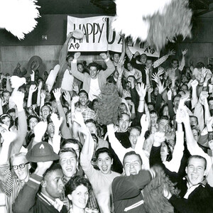 Students celebrate the establishment of ASU in 1958 by cheering and throwing pom-poms. Links to the ASU Digital Repository.