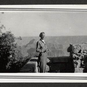 Black and white print of Fred Wilson at an overlook.