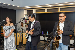 From left to right: Earth Surface People Performers Sydney Marian on vocals, Israel Solomon on congas, Dakota Yazzie on guitar and vocals, and Michael Gutierrez on sax