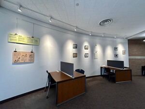 Photo of the Jean Chaudhuri Exhibit on the third floor of Fletcher Library at West campus