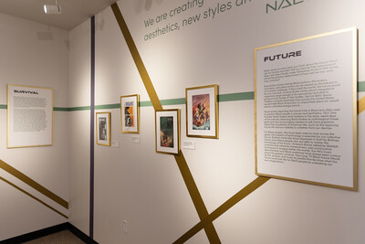 Exhibit wall display with text and artwork