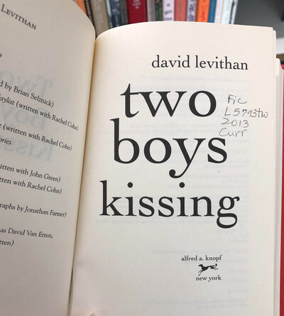 "Two Boys Kissing" book open to title page