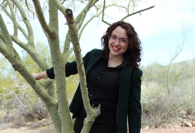 Portrait of Elaine Pratt outside next to a tree