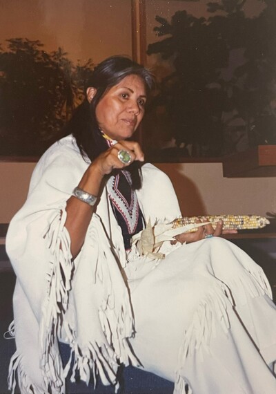 Photo of Jean Chaudhuri in white buckskin dress