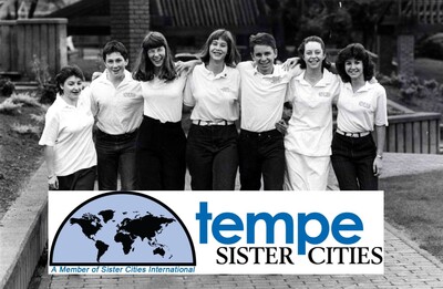 Group of people standing together with Tempe Sister Cities logo overlay